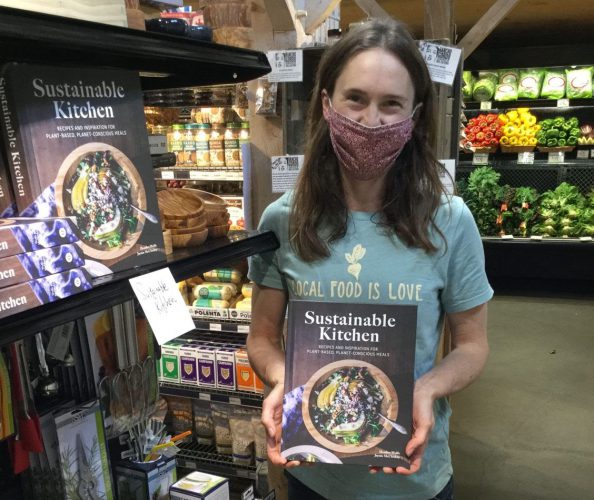 Heather Wolfe shows off the cookbook she co-authored with Jaynie McCloskey. “It’s what my family eats,” she said. Photo contributed by Heather Wolfe.